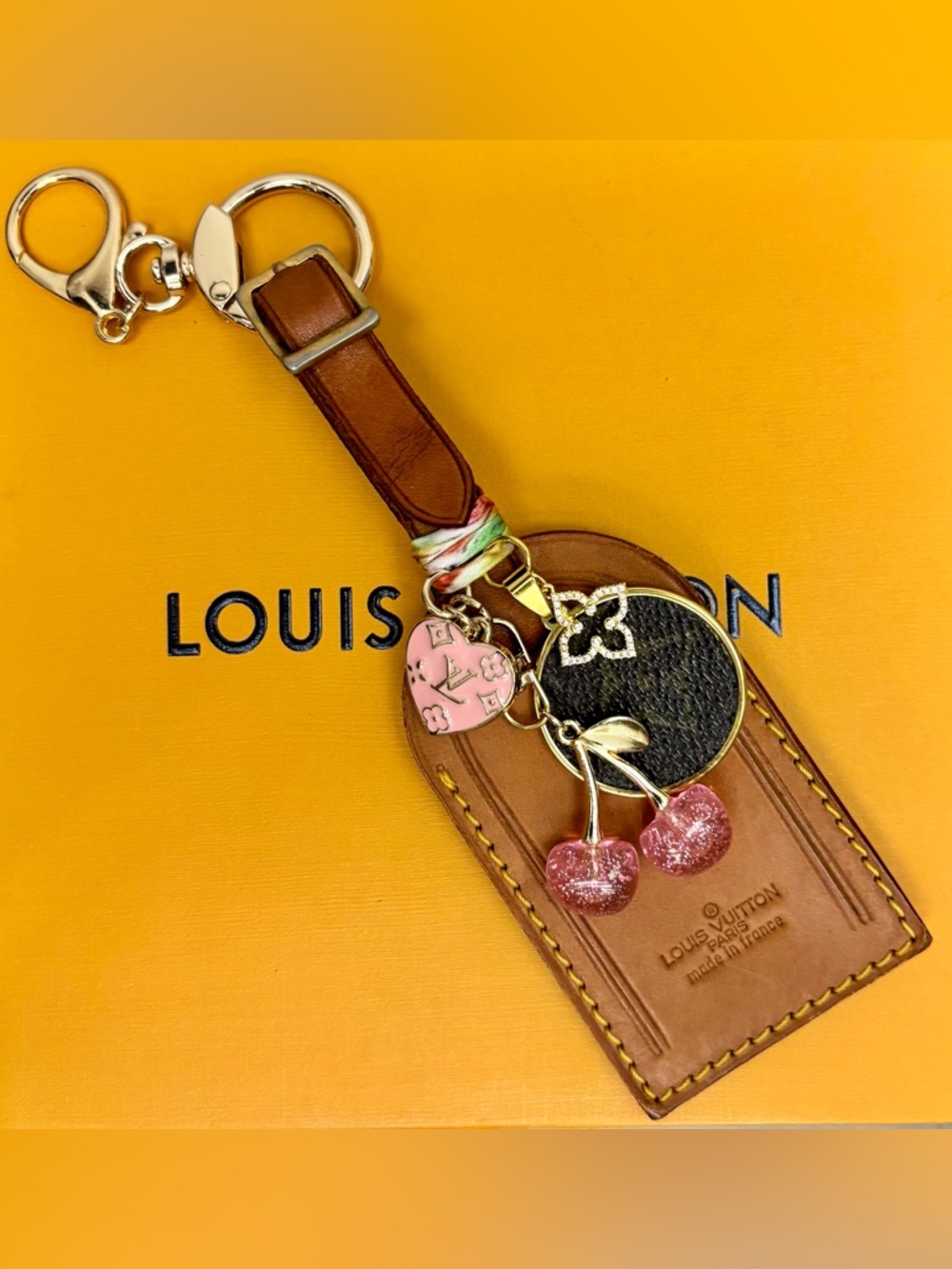 Authentic Louis Vuitton
Vachetta Bag Charm, Upcycled
LV Charm. 8 in.